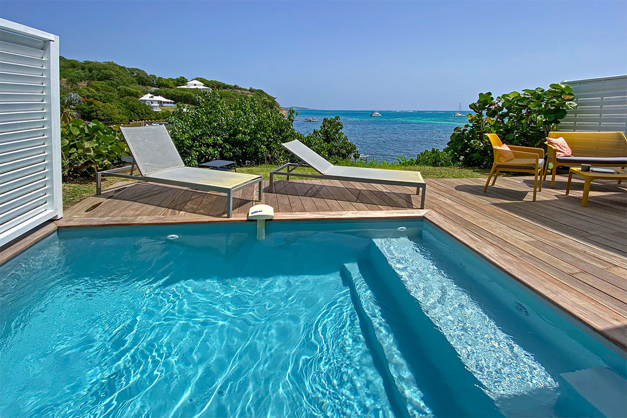 T5 LAGON TROPICAL133/134 Location luxe Martinique piscine pieds dans l'eau Cap est